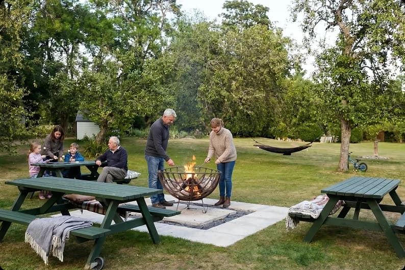 Guests relaxing outside at Upper Court