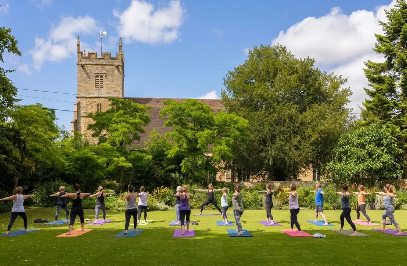 Outdoor pilates and yoga session in the garden