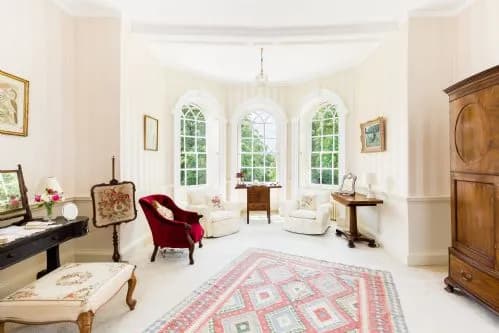 A bright manor house bedroom at Upper Court