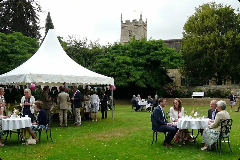 Family gathering on the lawn at Upper Court